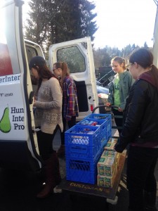 Hale students unloading food from Hunger Intervention Program (HIP) for their new Food Pantry